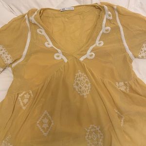Yellow embroidered blouse